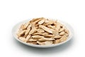 sliced Ã¢â¬â¹Ã¢â¬â¹of Astragalus (Huang Qi) in a ceramic dish Royalty Free Stock Photo